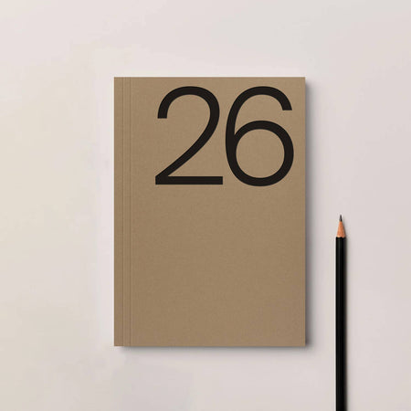 Brown notebook with the number 26 on a light gray background. Diary 2026 Planner | Kinshipped | Shop Fodder