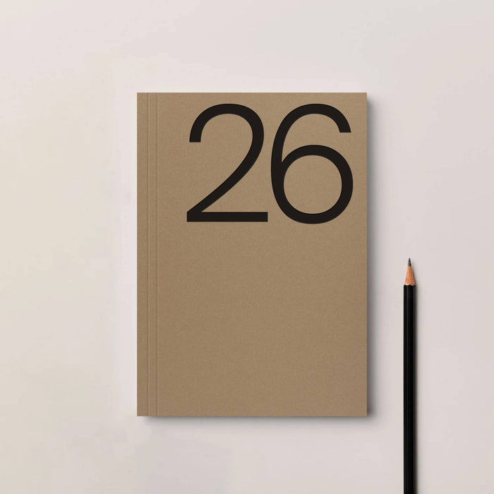 Brown notebook with the number 26 on a light gray background. Diary 2026 Planner | Kinshipped | Shop Fodder