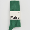 Green sock with 'Pairs' label on a light gray background | Pairs Socks | Shop Fodder
