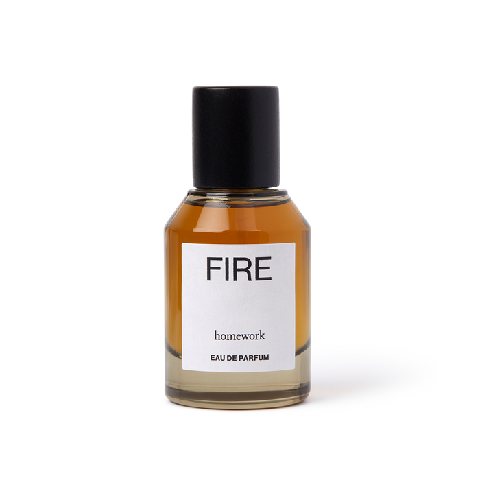 Perfume bottle labeled 'FIRE' by 'homework' on a white background | Homework Store | Shop Fodder