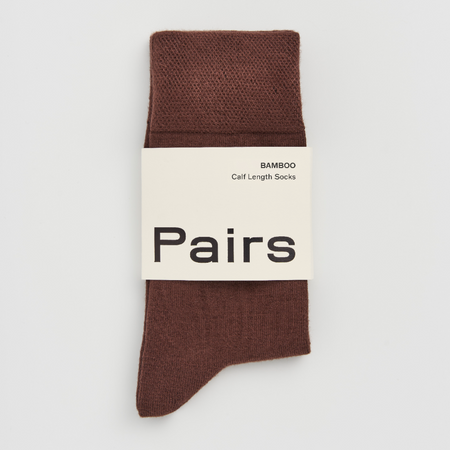 Brown sock with 'Pairs' packaging on a white background | Pairs Socks | Shop Fodder