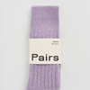 Purple socks with a 'Pairs' label on a light gray background | Pairs Socks | Shop Fodder