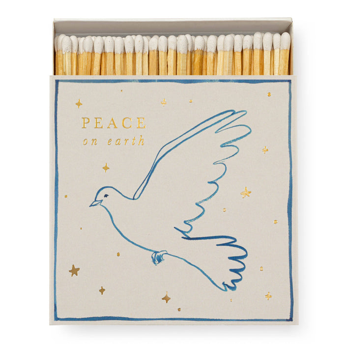 Matches with a dove design and 'Peace on Earth' text on a white background - Matches | Archivist Gallery | Shop Fodder