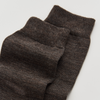 Pair of dark gray socks on a light gray background | Pairs Socks | Shop Fodder
