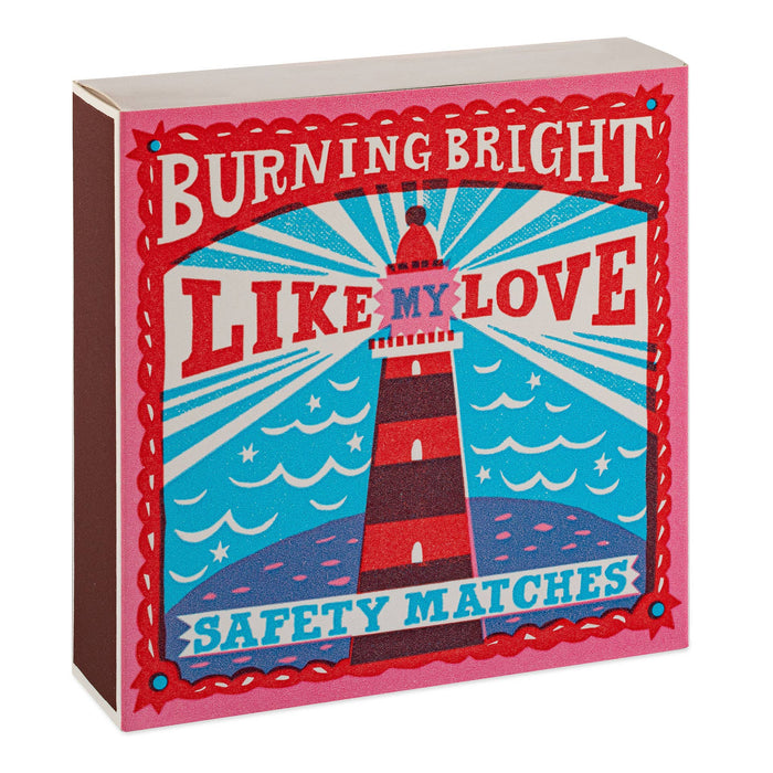 Matches box with a lighthouse design and text 'Burning Bright Like My Love'. - Matches | Archivist Gallery | Shop Fodder