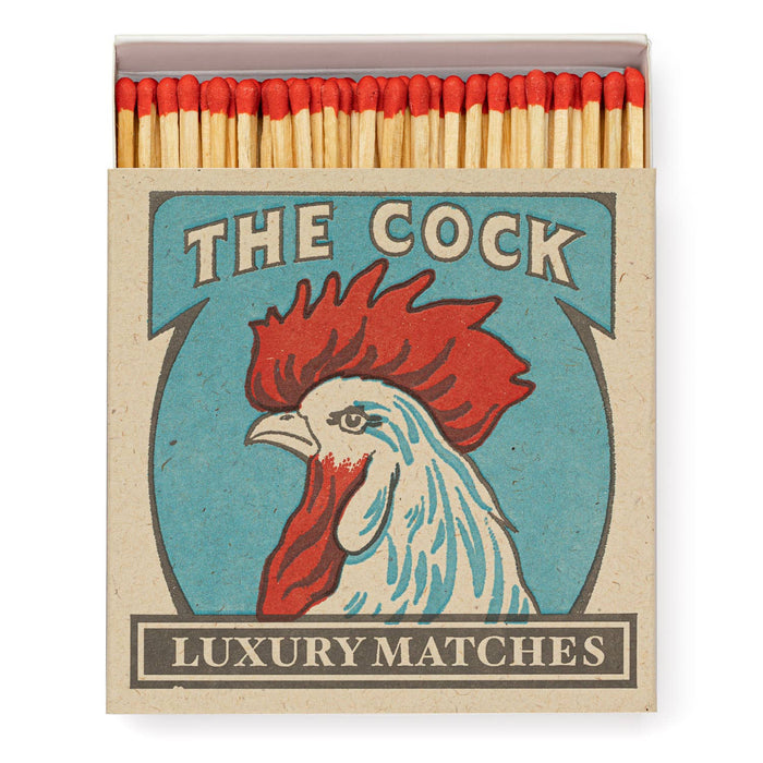 Matchbox with rooster illustration and 'The Cock Luxury Matches' text on a white background - Matches | Archivist Gallery | Shop Fodder