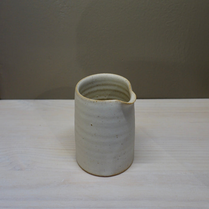 Small ceramic milk jug in white by Aku Ceramics | Shop Fodder