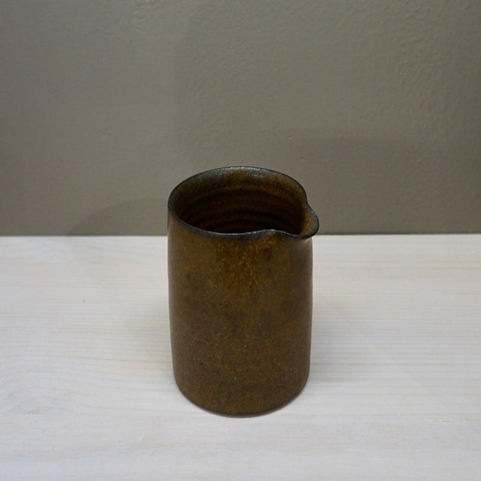 Small ceramic milk jug in brown by Aku Ceramics | Shop Fodder