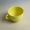 Yellow mug on a plain background. Syros Mug | Anna Jones Ceramics | Shop Fodder