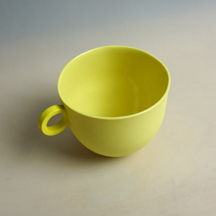 Yellow mug on a plain background. Syros Mug | Anna Jones Ceramics | Shop Fodder