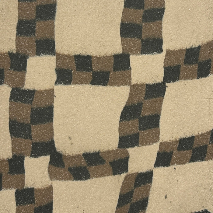 Close-up of a textured surface with a geometric pattern in brown, black, and beige. Fern Taylor Ceramic Vase | Shop Fodder