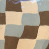 Close-up of a checkered fabric with brown, beige, and gray squares. Fern Taylor Butter Dish Ceramic | Shop Fodder