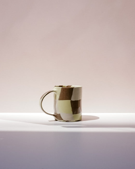 Ceramic mug with a geometric pattern on a white background. Fern Taylor Nerikomi Ceramics. Fodder
