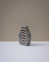 Handbuilt nerikomi bottle vase by Fern Taylor in layered coloured stoneware. Fodder