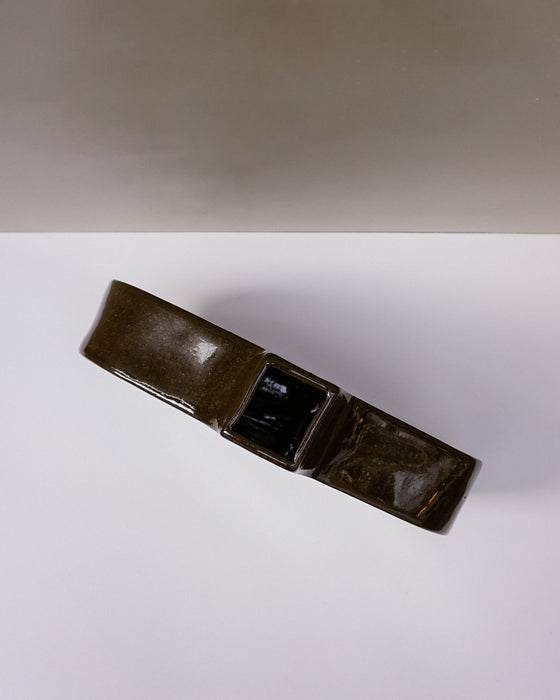 Overhead view of Fern Taylor's nerikomi swan vase showing the layered clay pattern and opening