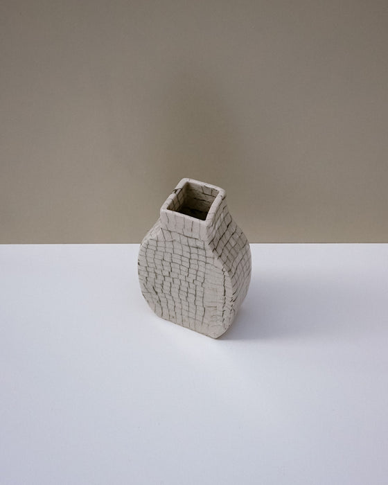 Handbuilt nerikomi bottle vase by Fern Taylor in layered coloured stoneware. Fodder