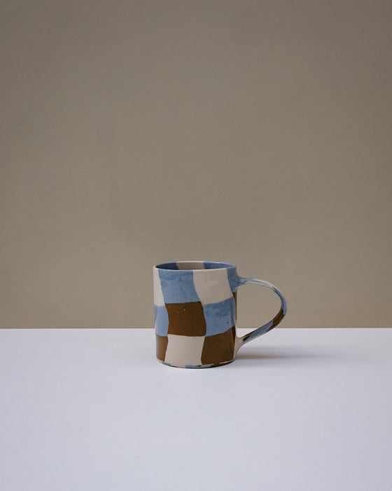 Handbuilt nerikomi check coffee mug by Fern Taylor in layered coloured stoneware. Fodder