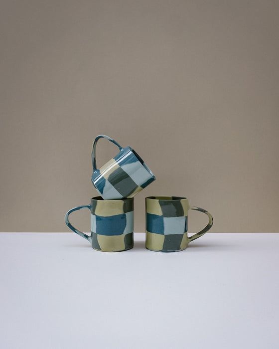 Handbuilt nerikomi check coffee mug by Fern Taylor in layered coloured stoneware. Fodder