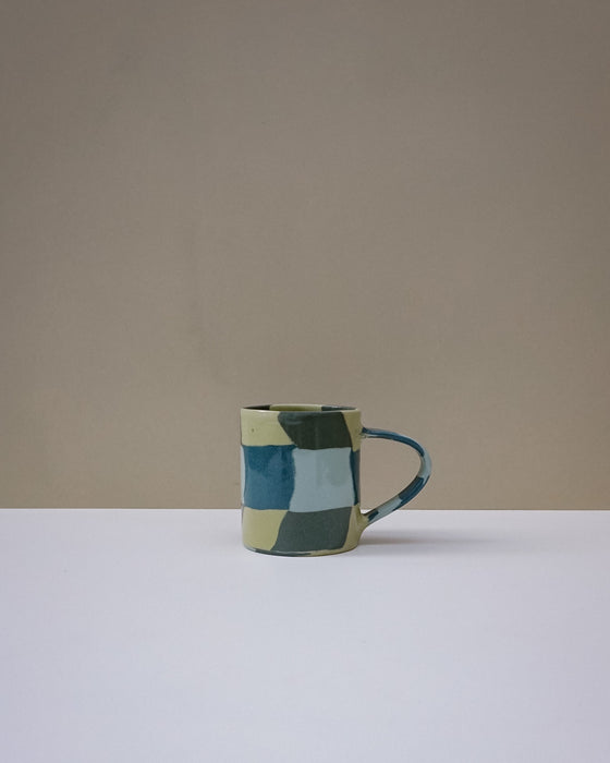Handbuilt nerikomi check coffee mug by Fern Taylor in layered coloured stoneware. Fodder.