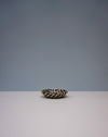Small ceramic dish with black and white pattern on a light gray background. Fern Taylor | Nerikomi Dish | Shop Fodder