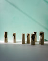 Sunlit group of Stem Vases. Janne Meier Ceramics | Wildflower Pebble Vase | Shop Fodder