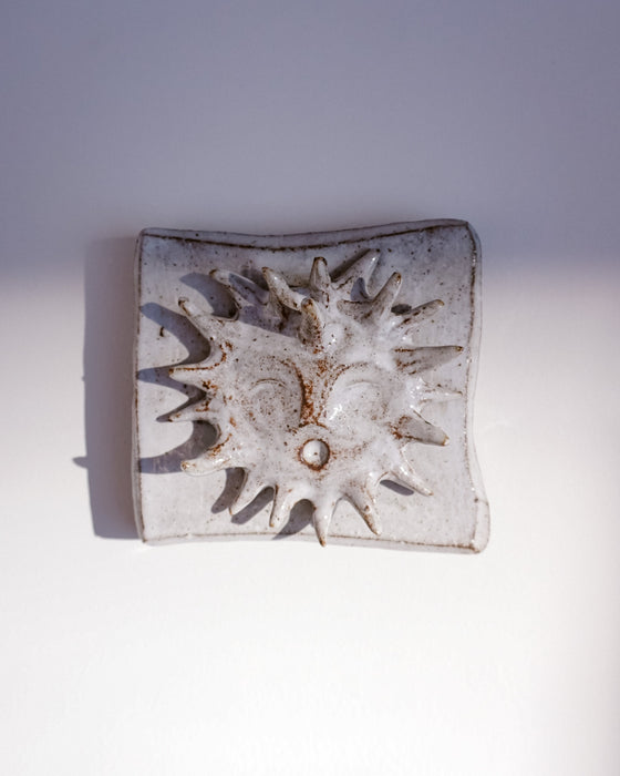Close up of raised sun and glaze texture - Lily Pearmain | Fodder