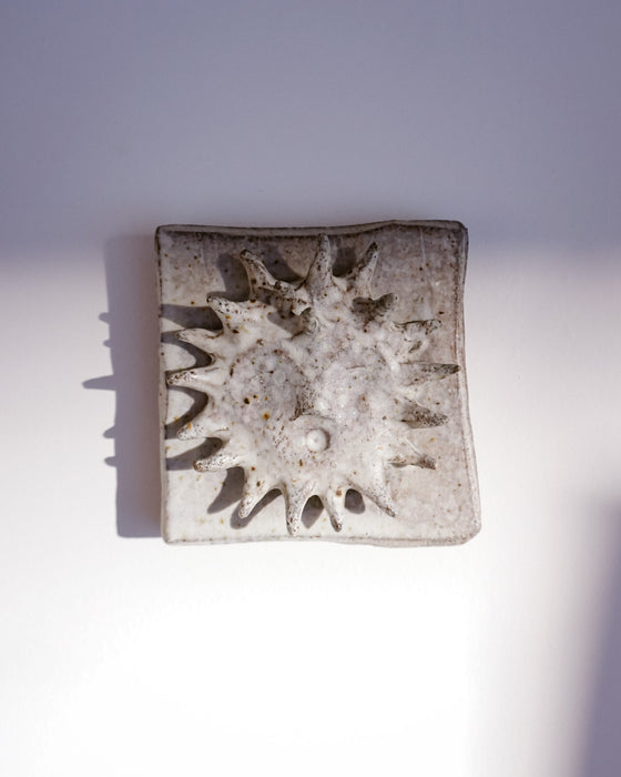 Close up of raised sun and glaze texture - Lily Pearmain | Fodder