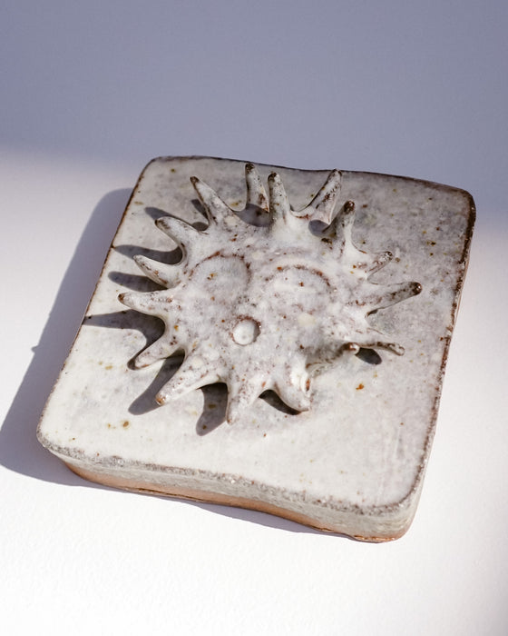 Close up of raised sun and glaze texture - Lily Pearmain | Fodder