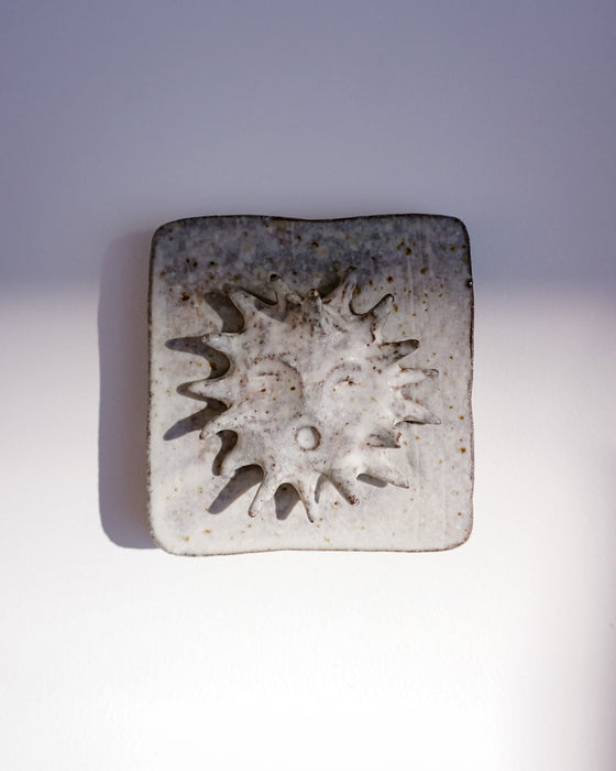 Close up of raised sun and glaze texture - Lily Pearmain | Fodder