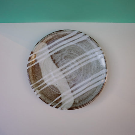 Ceramic plate with white slip surface decoration. Lily Pearmain Ceramics | Shop Fodder
