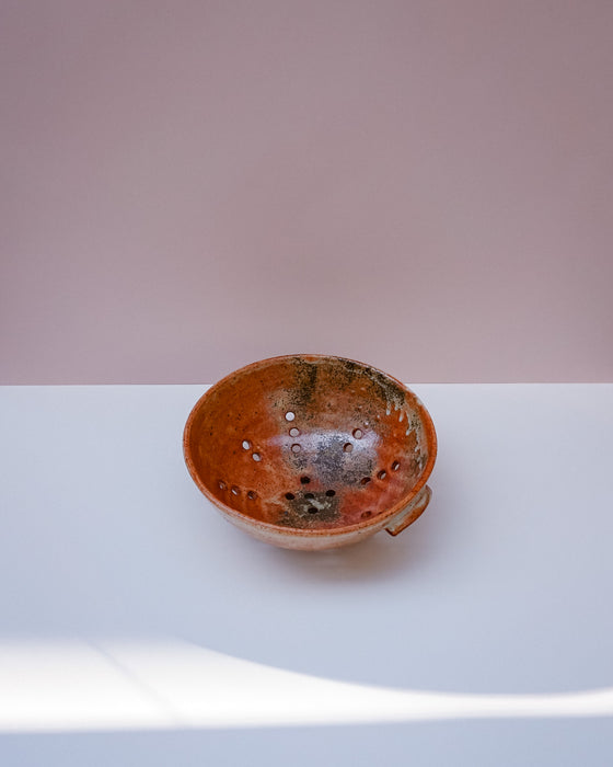 shino and wood ash glaze handmade ceramic colander by Scree Ceramics | Fodder