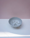 speckled white handmade ceramic colander by Scree Ceramics | Fodder