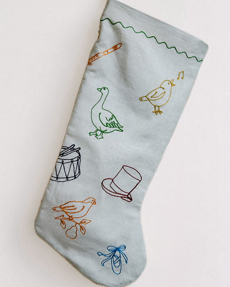 12 Days of Christmas embroidered linen Christmas stocking by See & Quin - carol motifs - Fodder