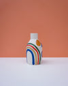 Vase with colorful design on a peach background. Sophie Alda | Handmade Ceramics | Shop Fodder