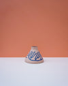 Ceramic vase with blue patterns on a peach and white background. Sophie Alda | Handmade Ceramics | Shop Fodder