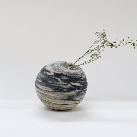 Marble-patterned vase with a branch on a white background | Janne Meijer | Shop Fodder
