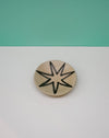 Ceramic disc with star design on a two-tone background. Diddy Bowl | Jode Pankhurst | Shop Fodder