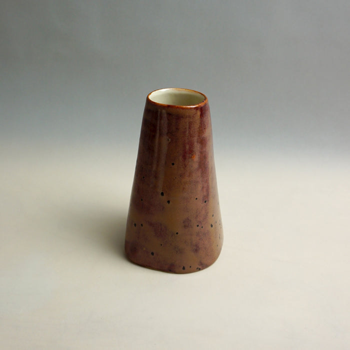 Cylindrical ceramic vase with a brown glaze on a gray background. Fluted Ceramic Vase | Jode Pankhurst | Shop Fodder