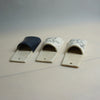 Three ceramic slideules with different designs on a neutral background. Pocket Wall | Jode Pankhurst | Shop Fodder
