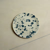 Round ceramic coaster with blue speckles on a beige background. Trinket Dish | Jode Pankhurst | Shop Fodder
