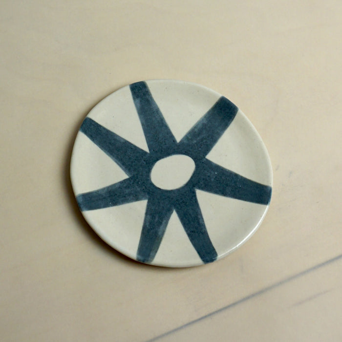 Ceramic plate with blue star design on a beige background. Trinket Dish | Jode Pankhurst | Shop Fodder
