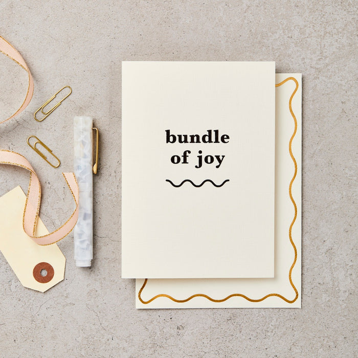 a card for a new baby that says bundle of joy. 