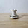 white handmade candlestick holder by Mae Ceramics. 
