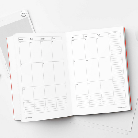 Open planner on a desk with a cup of coffee, pencils, and a notebook. Kinshipped Diary | Kinshipped | Shop Fodder