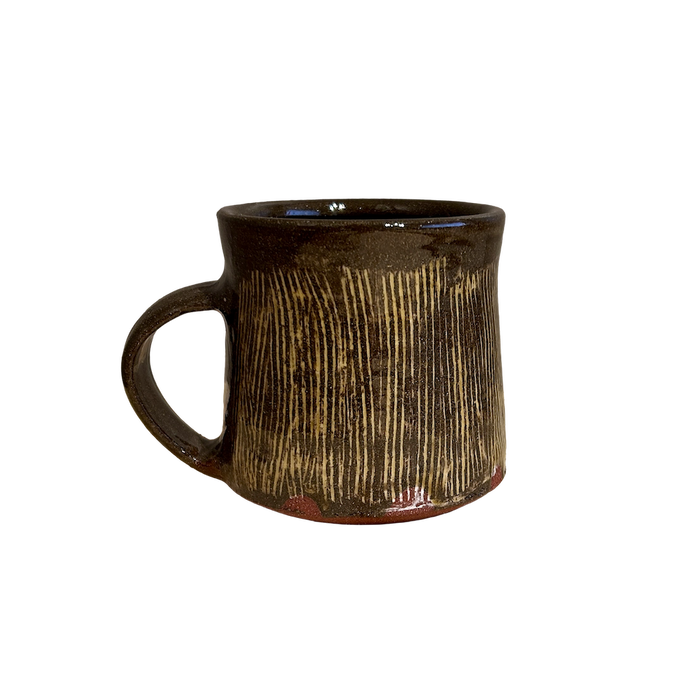 Brown ceramic mug with textured surface on a white background. Lily Pearmain Ceramics | Shop Fodder