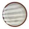 Ceramic plate with brown rim and gray and white striped interior on a white background. Lily Pearmain Ceramics | Shop Fodder