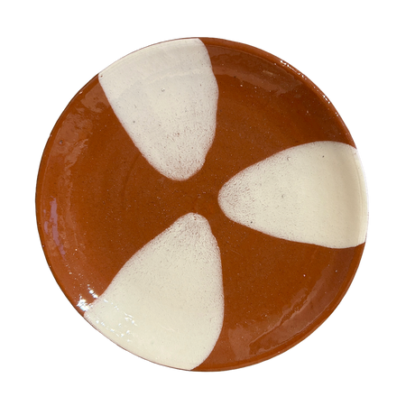 Round ceramic plate with brown and white design on a white background. Lily Pearmain Ceramics | Shop Fodder
