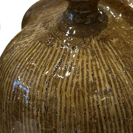 Close-up of a brown ceramic salt pig with textured surface. Lily Pearmain Ceramics | Shop Fodder