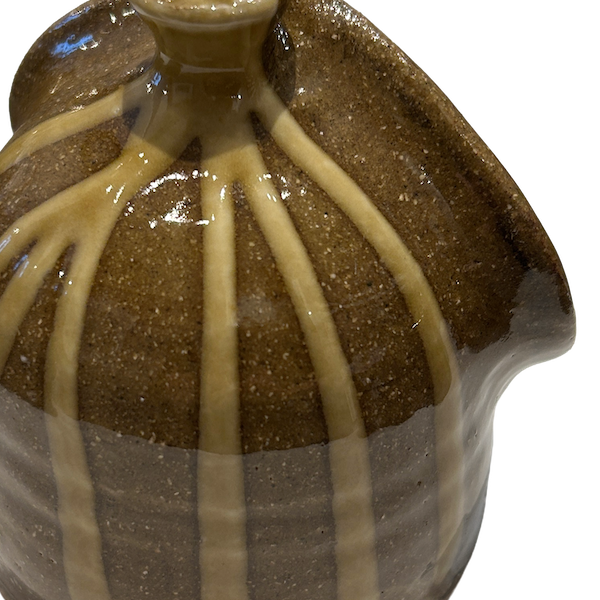 Ceramic Salt Pig with brown glaze and beige drizzle pattern on a white background. Lily Pearmain Ceramics | Shop Fodder