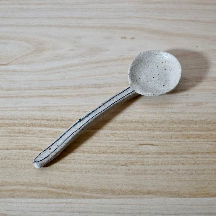 short handmade spoon with line detail by Mae Ceramics